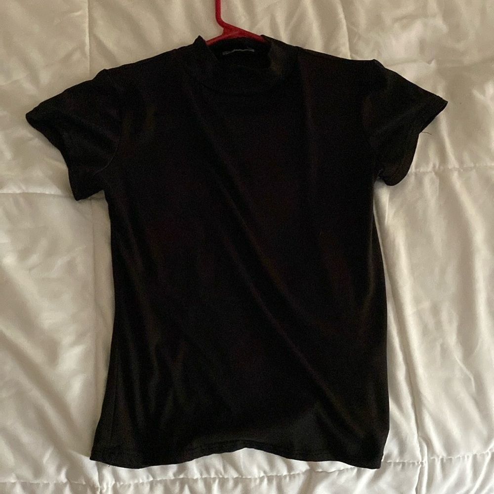 Croped black turtle neck t shirt very stretchy and in good condition